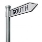 8406383-road-sign-to-the-south-geographical-direction.jpg