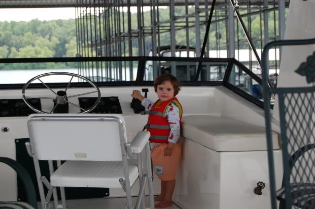 cooper driving houseboat